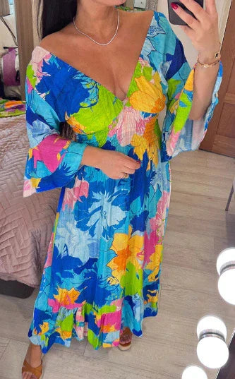 50% OFF💃V-neck Floral Seaside Vacation Loose Dress