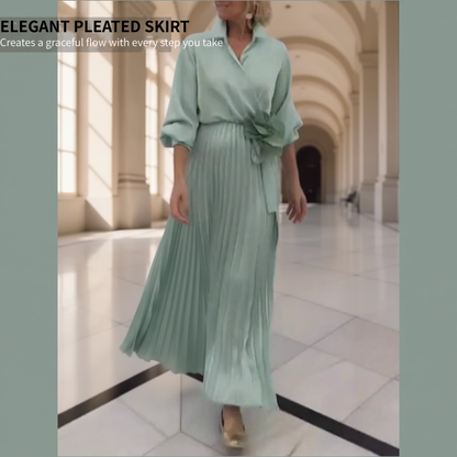 Elegant Pleated Maxi Dress with Floral Waist Detail