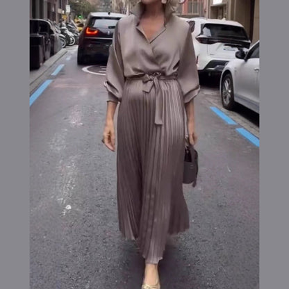 Elegant Pleated Maxi Dress with Floral Waist Detail