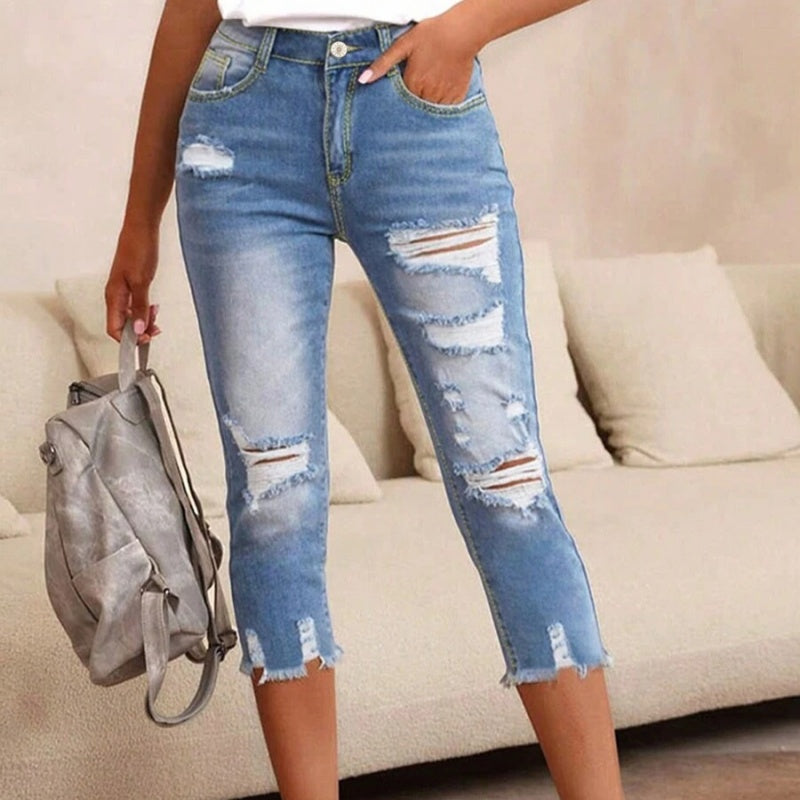 💥 Fashion Women's Ripped Washed Jeans with Raw Hem Detail