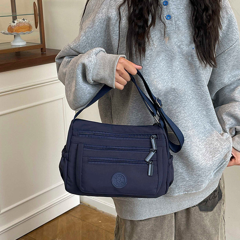 🔥HOT SALE👜✨Lightweight Nylon Multi-Pocket Crossbody Bag