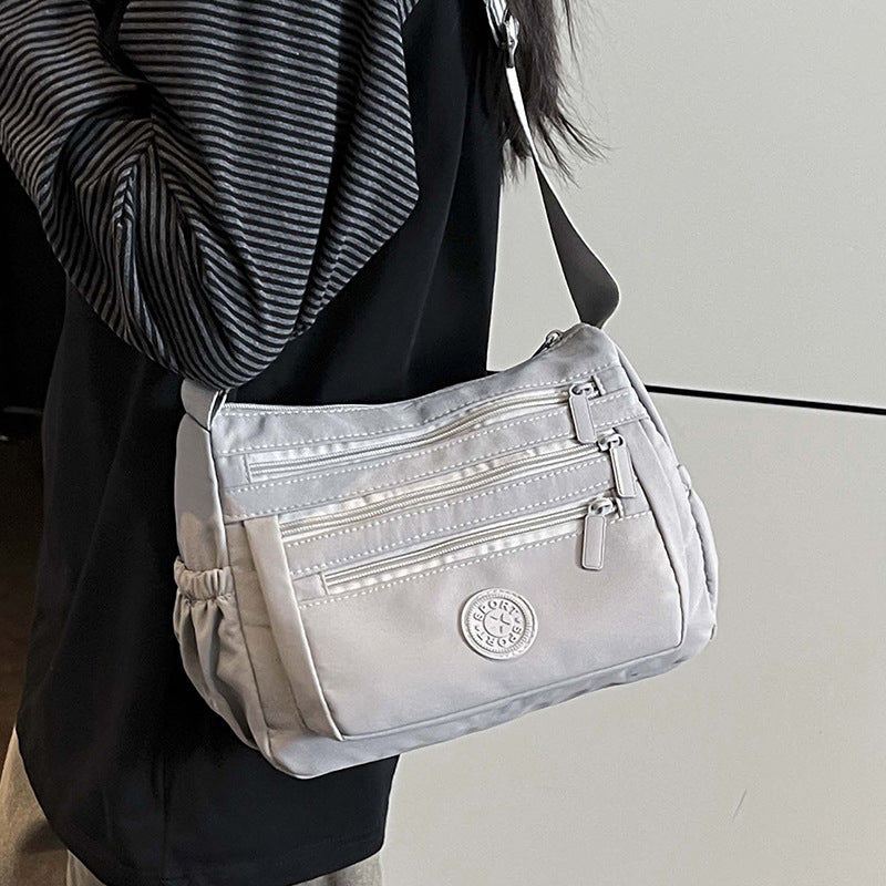 🔥HOT SALE👜✨Lightweight Nylon Multi-Pocket Crossbody Bag