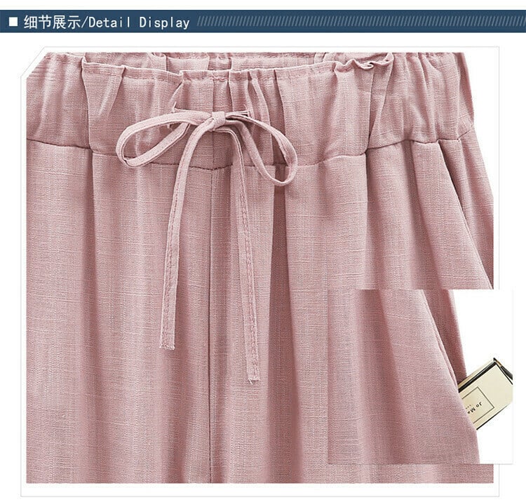 Women's trousers with elasticated waistband in plain colour / seven-quarter trousers