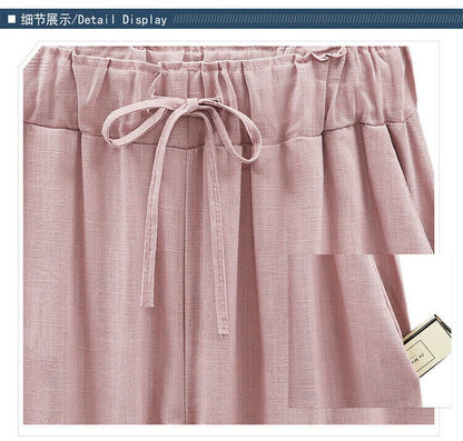 Women's trousers with elasticated waistband in plain colour / seven-quarter trousers
